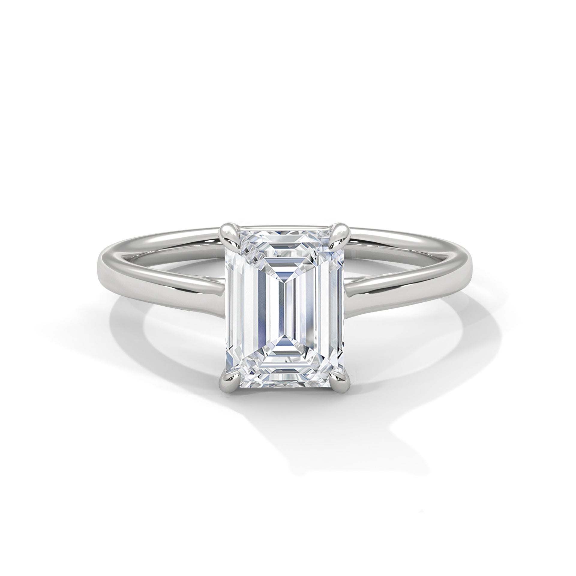 Symbol Emerald Solitaire Ring