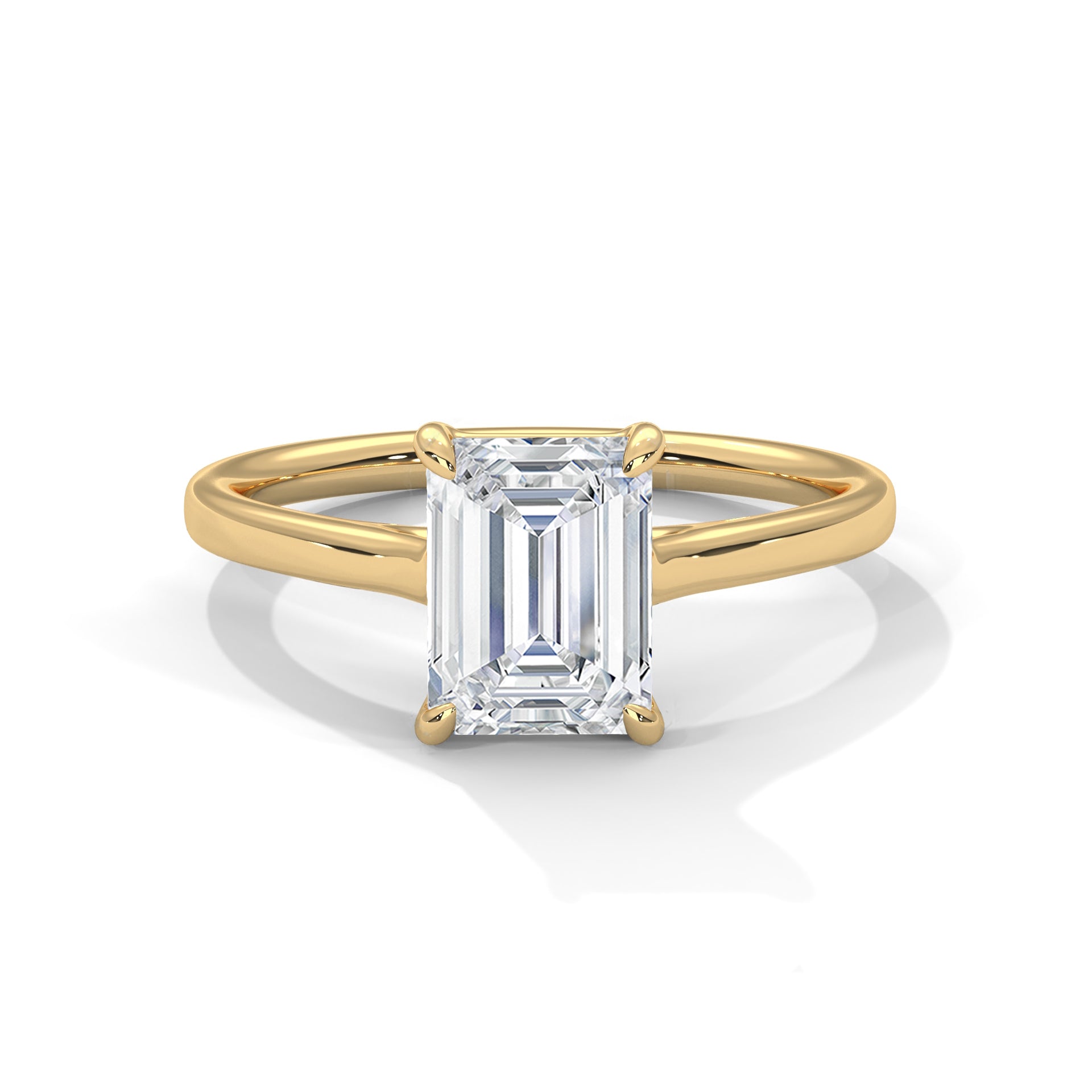 Symbol Emerald Solitaire Ring