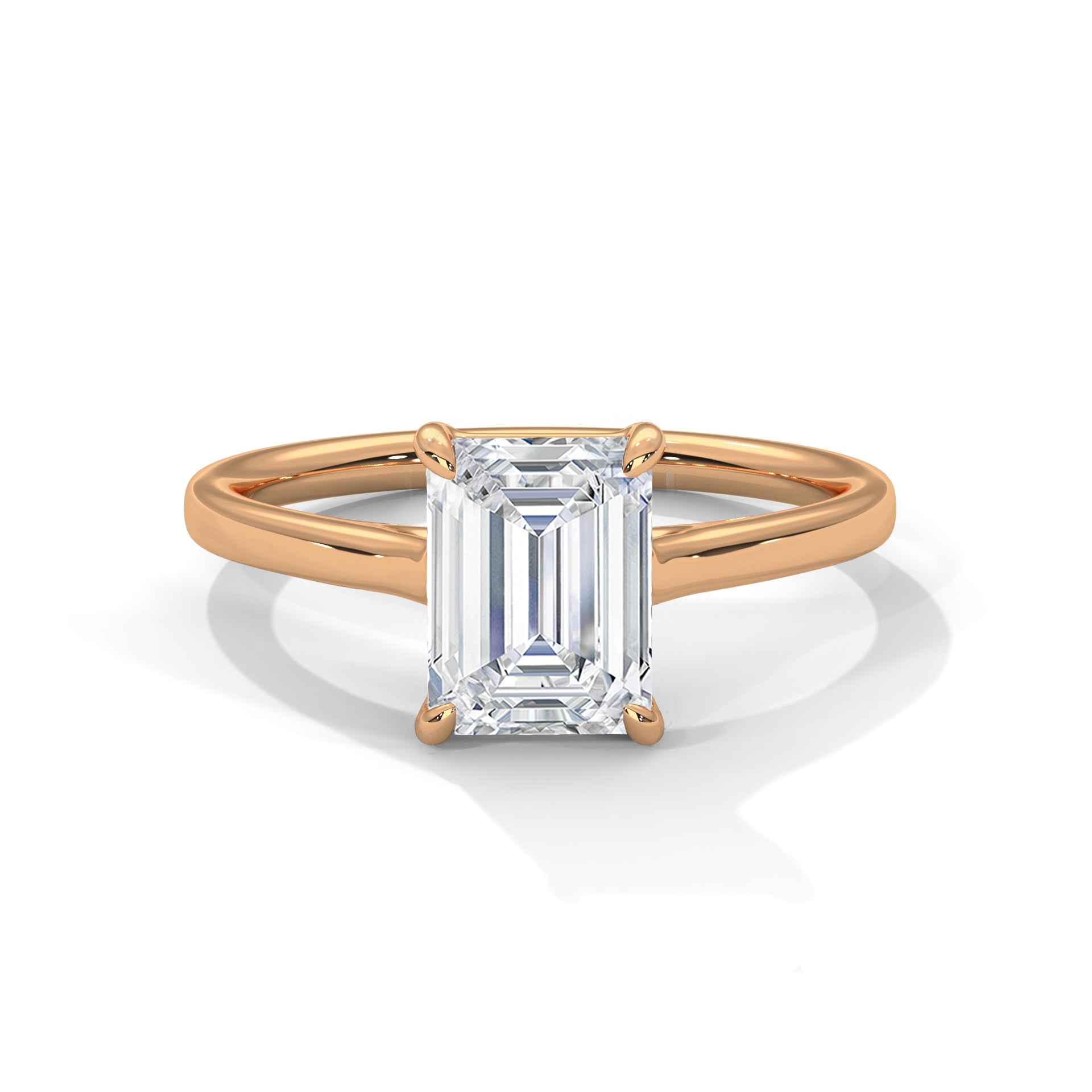 Symbol Emerald Solitaire Ring